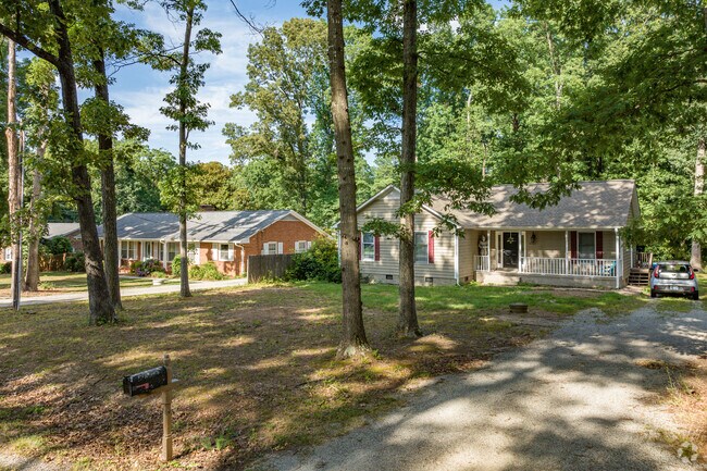 Some homes in Hilltop sit under the shade of large, tree-filled lots.