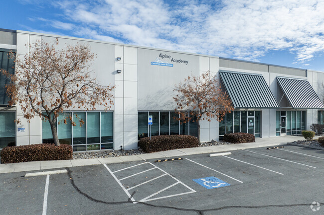 The front left exterior of the Alpine Academy.