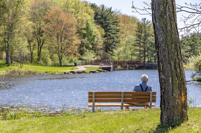 Enjoy the fresh air and beautiful views of the pond at Deer Lakes Park.