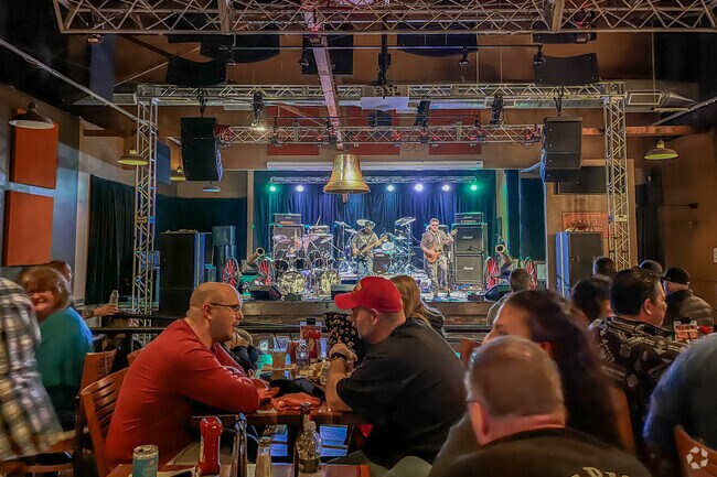 Locals gather to watch an opening band at the Crafthouse in Whitehall.
