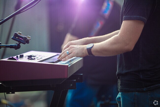 Local talent playing in amphitheater at Springdale Community Center.