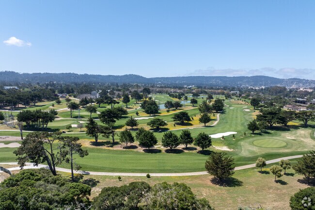 Just minutes away, Monterey Pines Golf Course provides coastal views and approachable play.