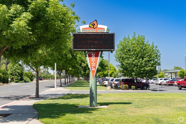 A lighted marquee at the entrance of Lindsay Senior High School informs parents of events.