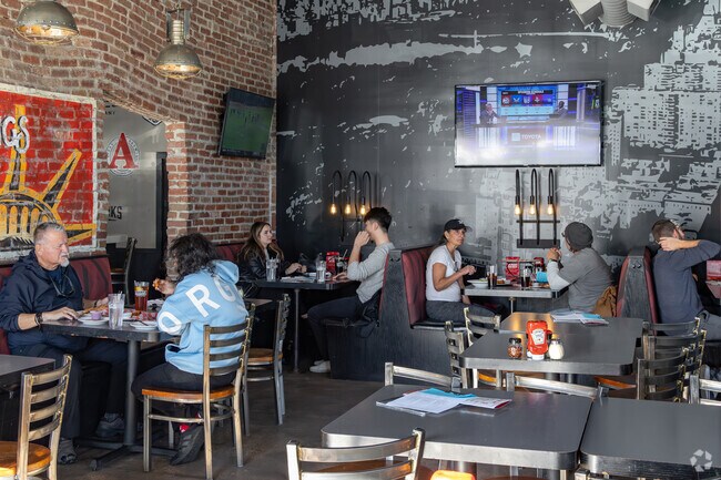 Near Hillcrest, Parry’s Pizzeria & Taphouse is a favorite for wings, pizza, and the game.
