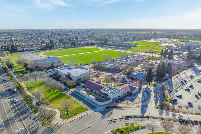 Katherine L. Albiani Middle School is located next to Pleasant Grove High School.