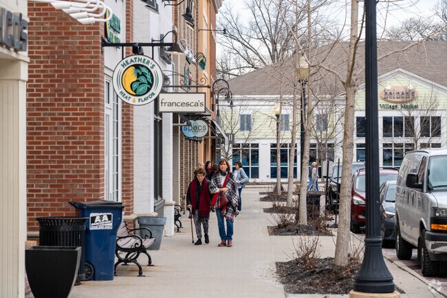 Residents of Hudson enjoy the wide sidewalks of downtown.