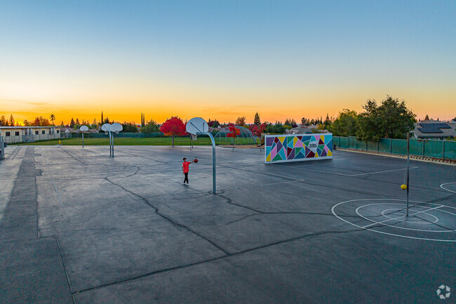 Boy plays basketball at Ruhkala Elementary School.