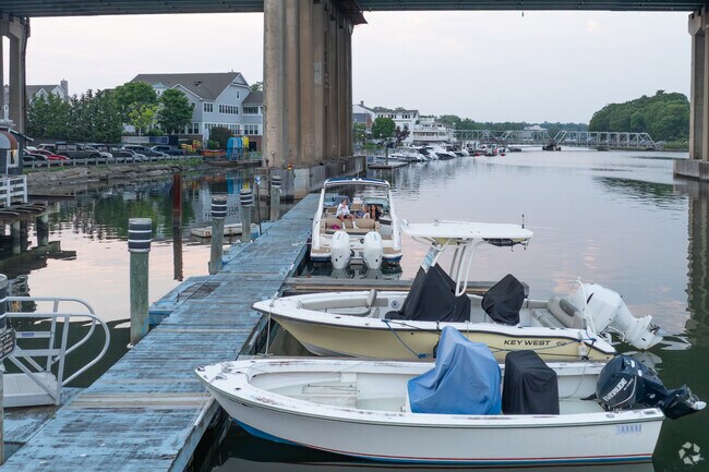 Boaters in Red Coat enjoy life on the river.