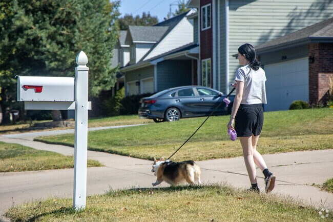 Residents of Fox Hollow enjoy walking along the neighborhood's winding sidewalks.