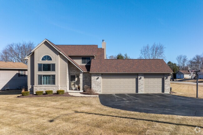 New traditional houses with attached 3 car garages are abundant in Parker's Highlands.