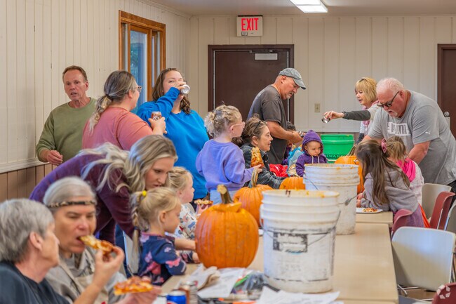 Pizza and gatherings make the Public Pumpkin Carving event a hit with locals of Shawano.