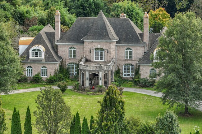 This mansion is a mix of Italian and French renaissance revival resembling an old world castle.