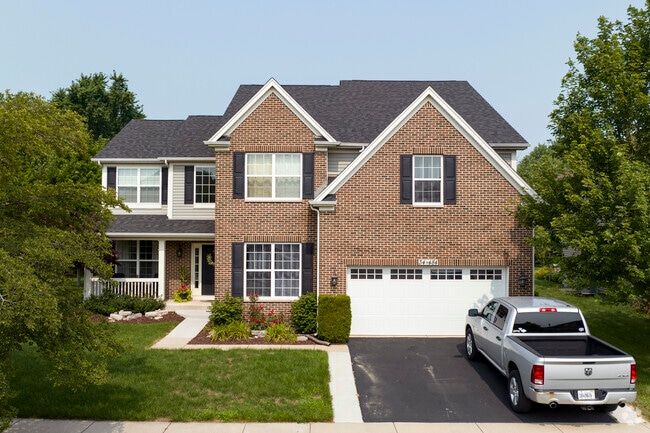 Red brick homes with mature trees are common in the neighborhood of Valley View.