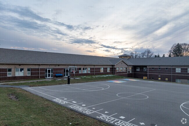 Discover a world of fun and learning at Cambridge Primary School's vibrant playground.