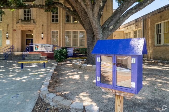 There is a mini library out front of Charles Graebner Elementary School.