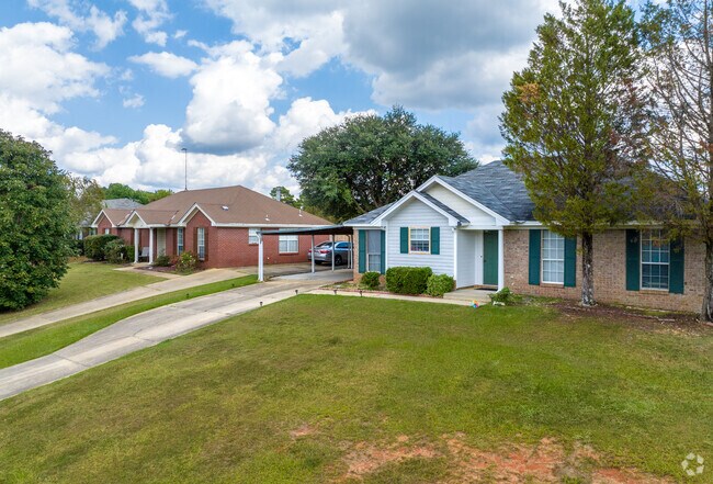 Homes in Millbrook tend to have large front yards and long driveways.