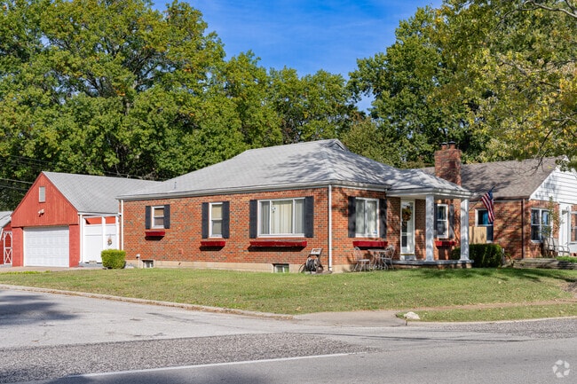 Early- to mid-20th-century brick home with a detached garage in Berkeley.