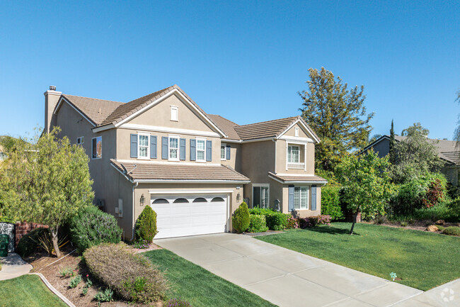 A spacious residence with beautiful landscaping located in Winchester-Silverhawk.