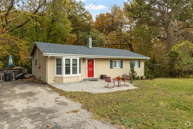A lovely red door and bay window adorn this ranch home in Peerless Park.