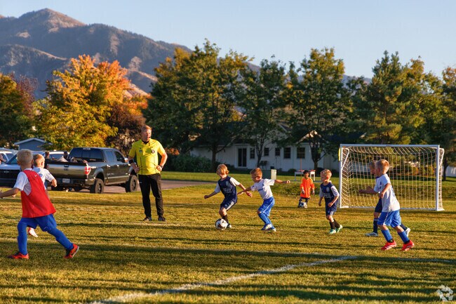 The open fields and community amenities at Legacy Park make it a favorite destination for recreation and relaxation.