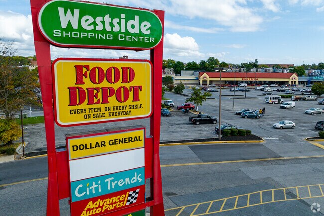 Westside Shopping Center near Gwynns Falls features groceries, eateries, and retail.