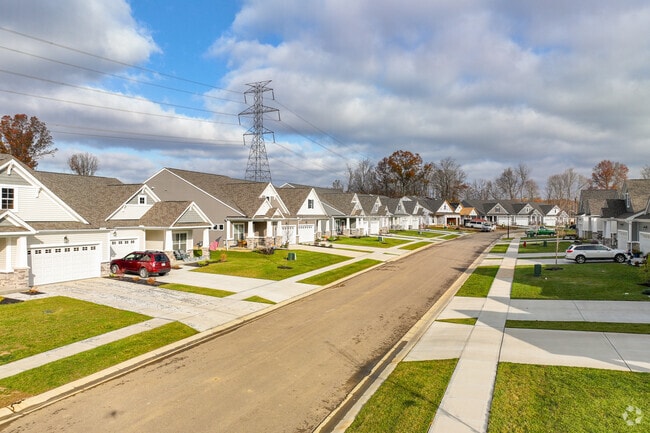Sidewalks and driveways make Mount Carmel's streets organized and clean.