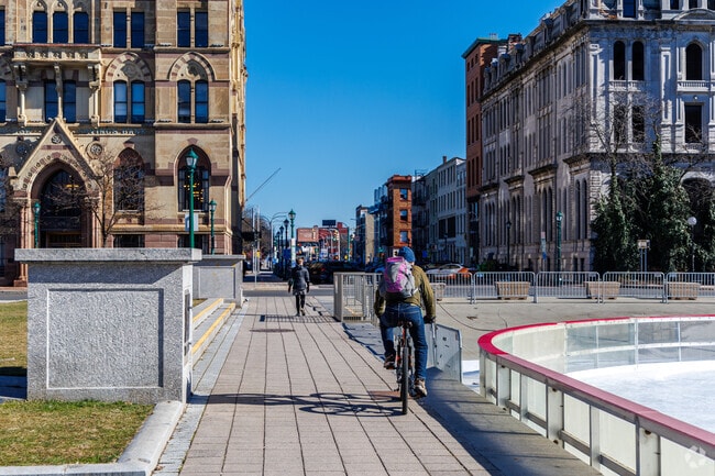 Come take a bike ride in Clinton Square park in Downtown Syracuse.