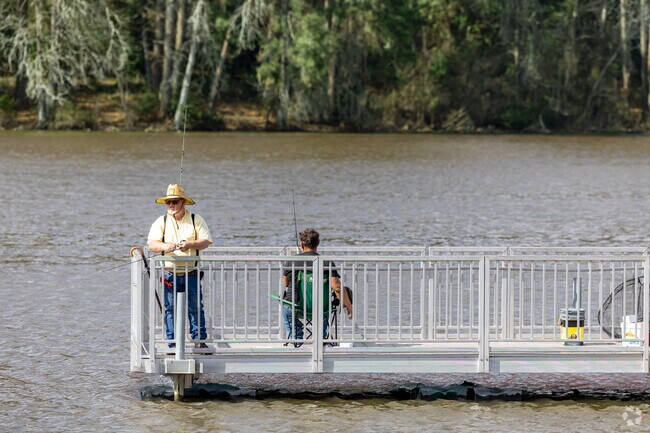 Anglers gather at the pier to reel in their next big catch at Ellen Trout Park.