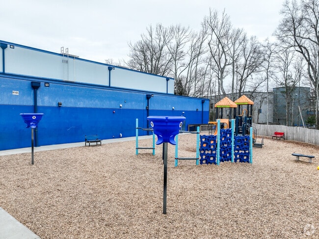 Kids enjoy the playground at Mallard Creek STEM Academy.