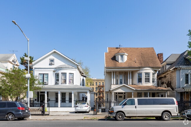 Large homes with driveways can be found in Fordham Heights.