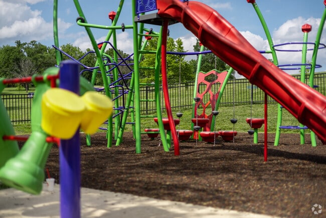 The playground in Davidson's Englewood Park is a colorful and modern playset that is well loved.