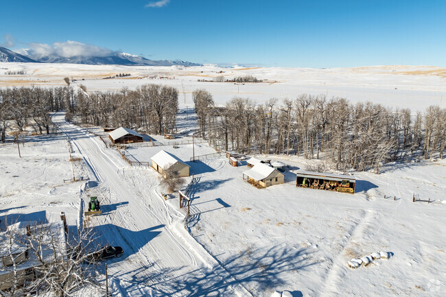 Homes in Luther sit far apart, providing land for raising cattle.