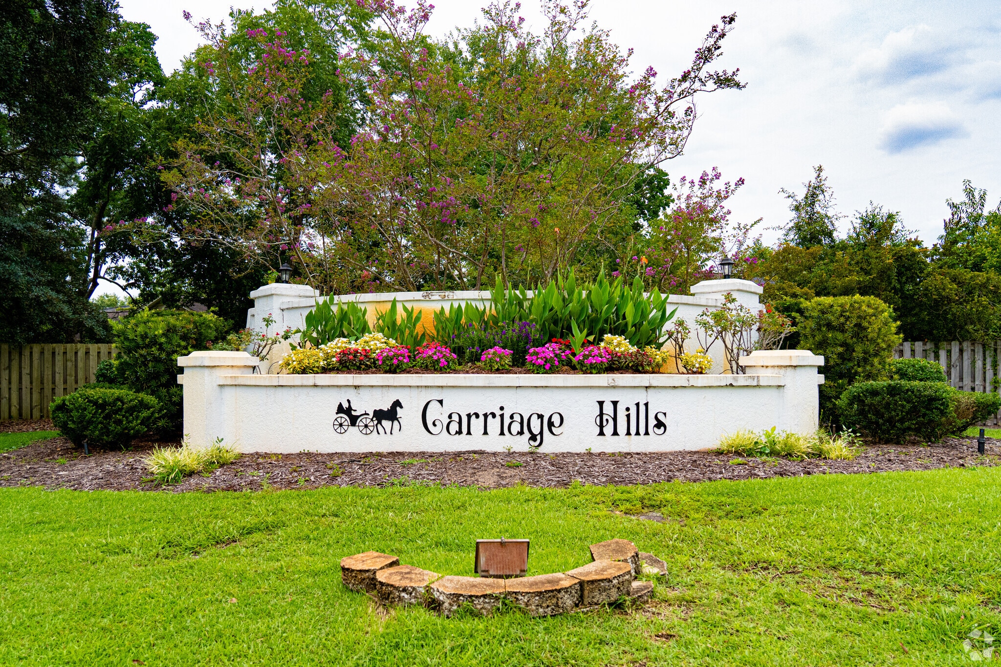 Carriage Hills homes often feature yards framed by trees and decorated with shrubbery.