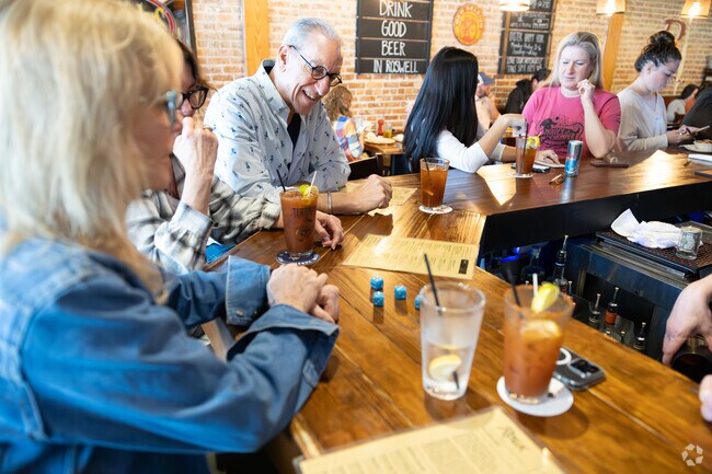 Rolling the dice and enjoying the company of the locals in downtown Roswell.