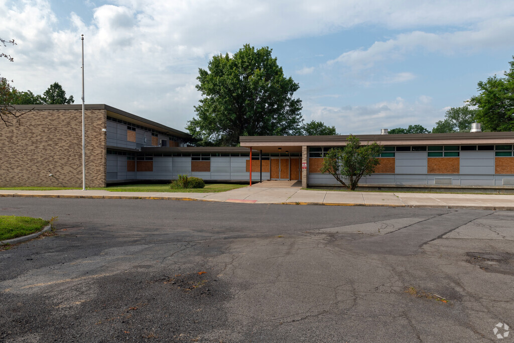 Closed since 2021, the George R. Staley Upper Elementary School has been securely boarded-up.