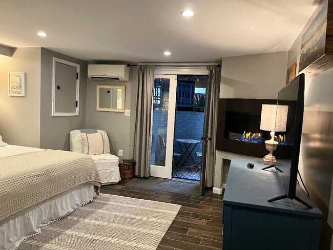 Large bedroom with Fireplace & Patio