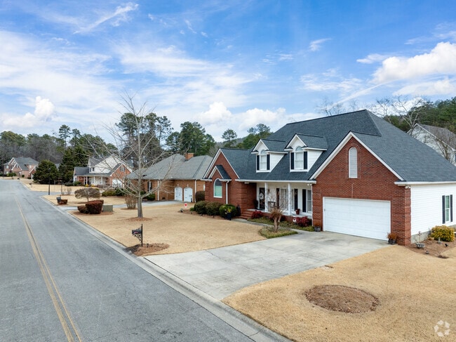 One of the delightful new traditional homes nestled in the charming suburbs of Rome, GA.