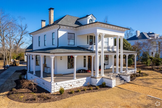 Come home to a grand entrance with large front porches in the Newnan neighborhood.