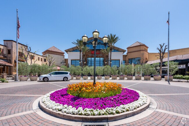 The beautifully landscaped Westfield Town Center entrance welcomes Valencia shoppers.