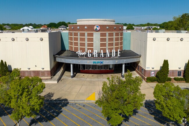 Starmount Forest. Drone shot of Regal Greensboro Grande Cinema in Friendly Center