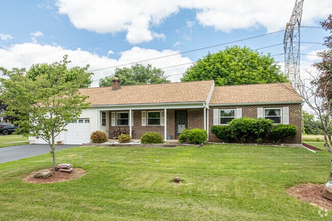 A ranch home with a two-car garage is a common sight along many East Coventry roads.