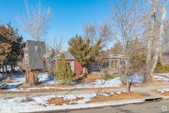 Another beautiful example of a century-old bungalow showcases classic craftsmanship and a warm, welcoming atmosphere. These homes offer a glimpse into Erie's past while providing a cozy living environment for families today.