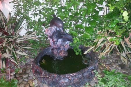 One of 3 Fountains w/ benches in garden