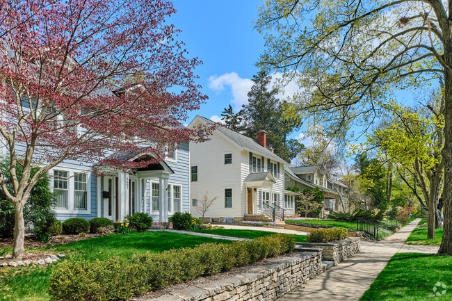 Front porches with ornate columns adorn some Colonial-style homes in North Burns Park.