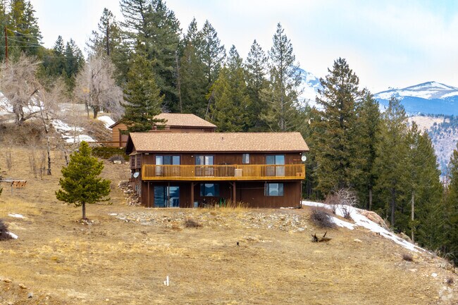 Traditional homes in Floyd Hill often feature rustic accents or log-cabin inspired touches.