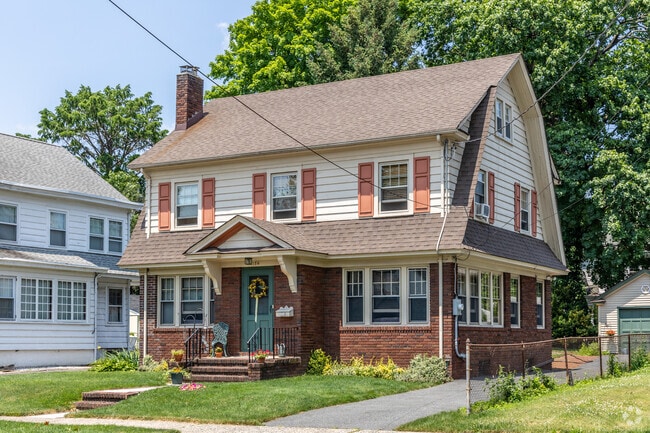 Dutch colonial home in Middle Village with a unique design, offering versatile living spaces.