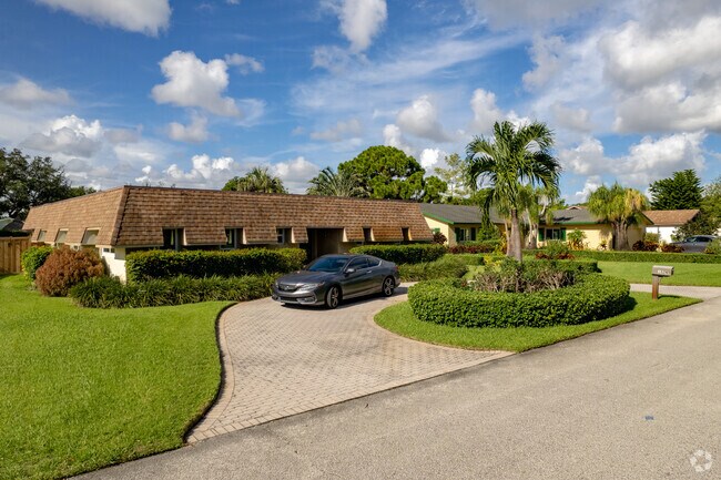 Unique home styles are frequently found in Lake Clarke Shores, FL.