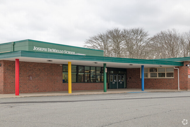Joseph DeMello Elementary School in Dartmouth invites students with brightly colored columns.