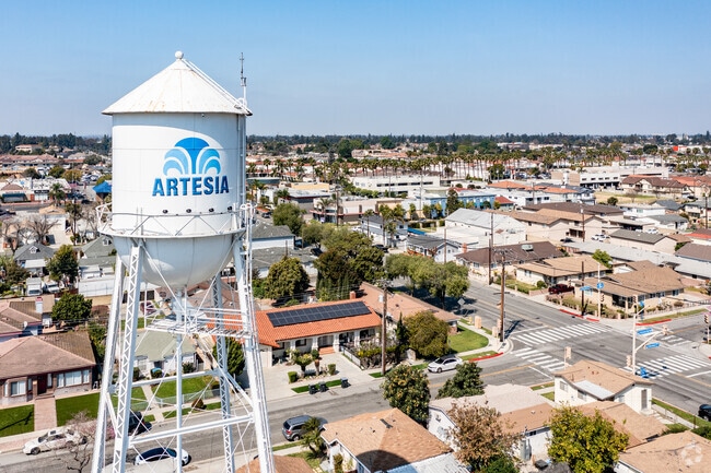 Artesia welcomes all with a cute water tower above the city.