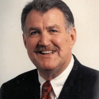 JOHN M. GRISLEY